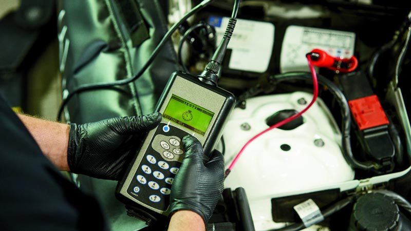Automotive tech using an testing scanner
