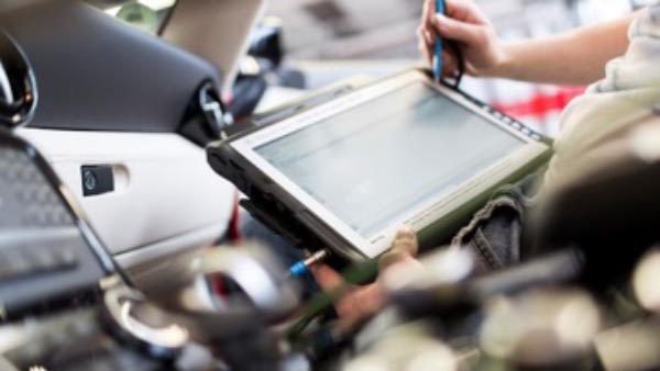 Technician working with tablet