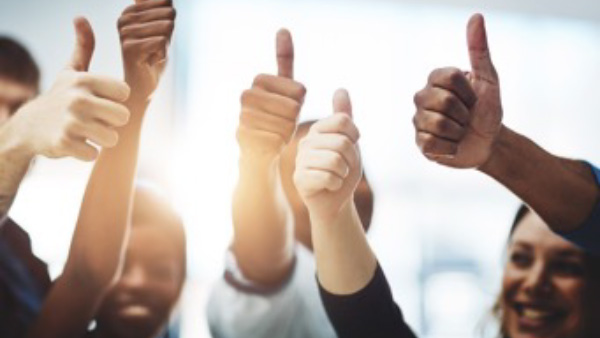 Group of hands with thumbs up