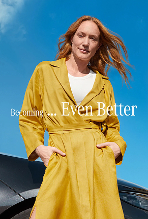 Woman wearing a jacket with overlay text: "Becoming...Even Better"