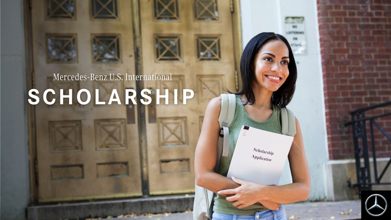 Woman holding a scholarship application